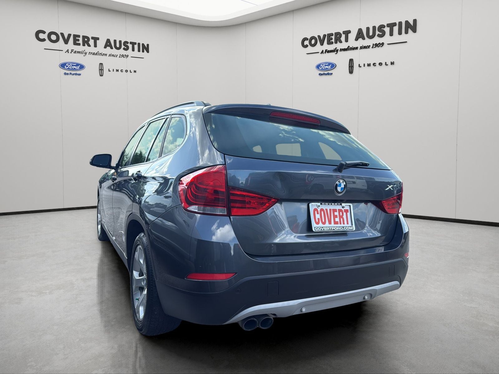 Used 2015 BMW X1 28i with VIN WBAVM1C55FV316770 for sale in Hutto, TX