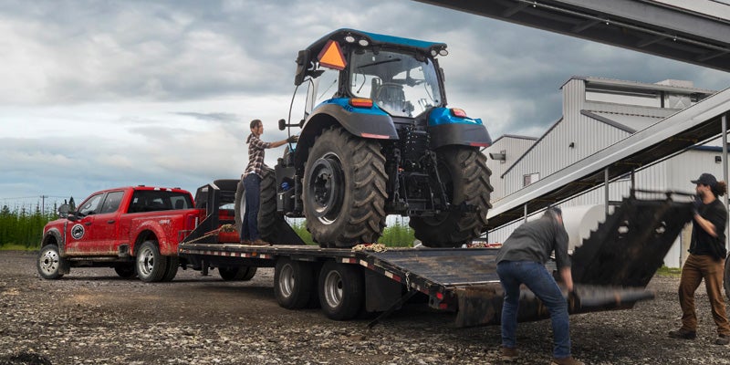 2025-ford-super-duty-hauling-heavy-equipment